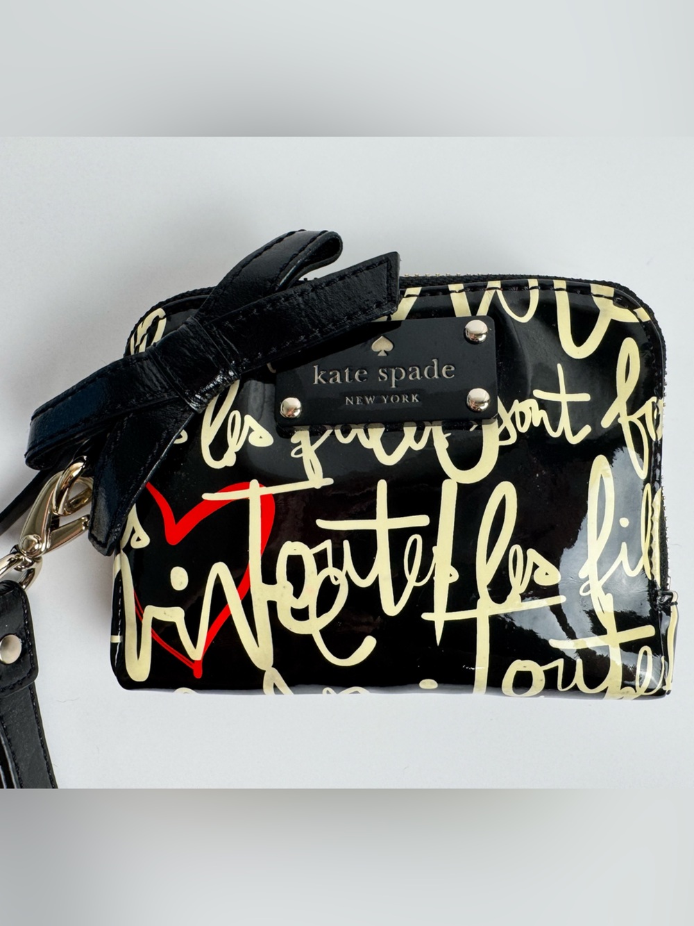 kate spade Black Patent Scribble Wristlet with Red Accent
